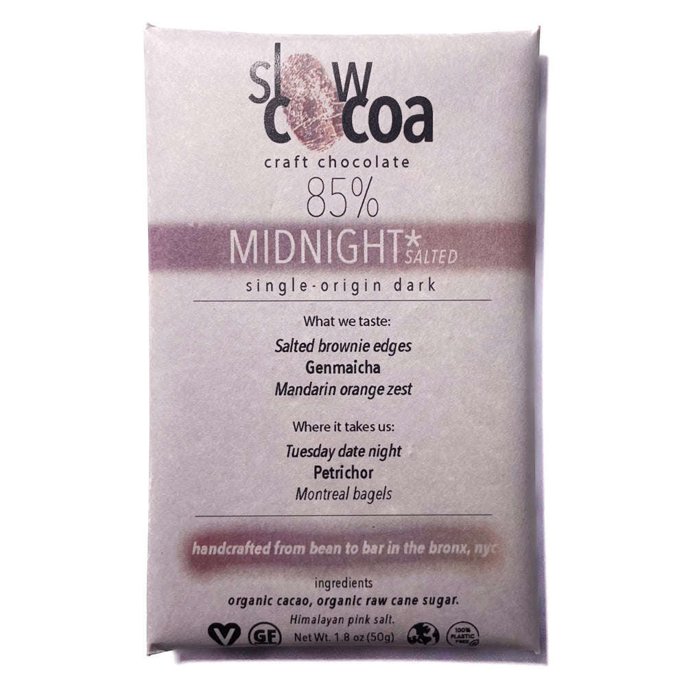 Box of slowcocoa craft chocolate with 85% cocoa content on a white background