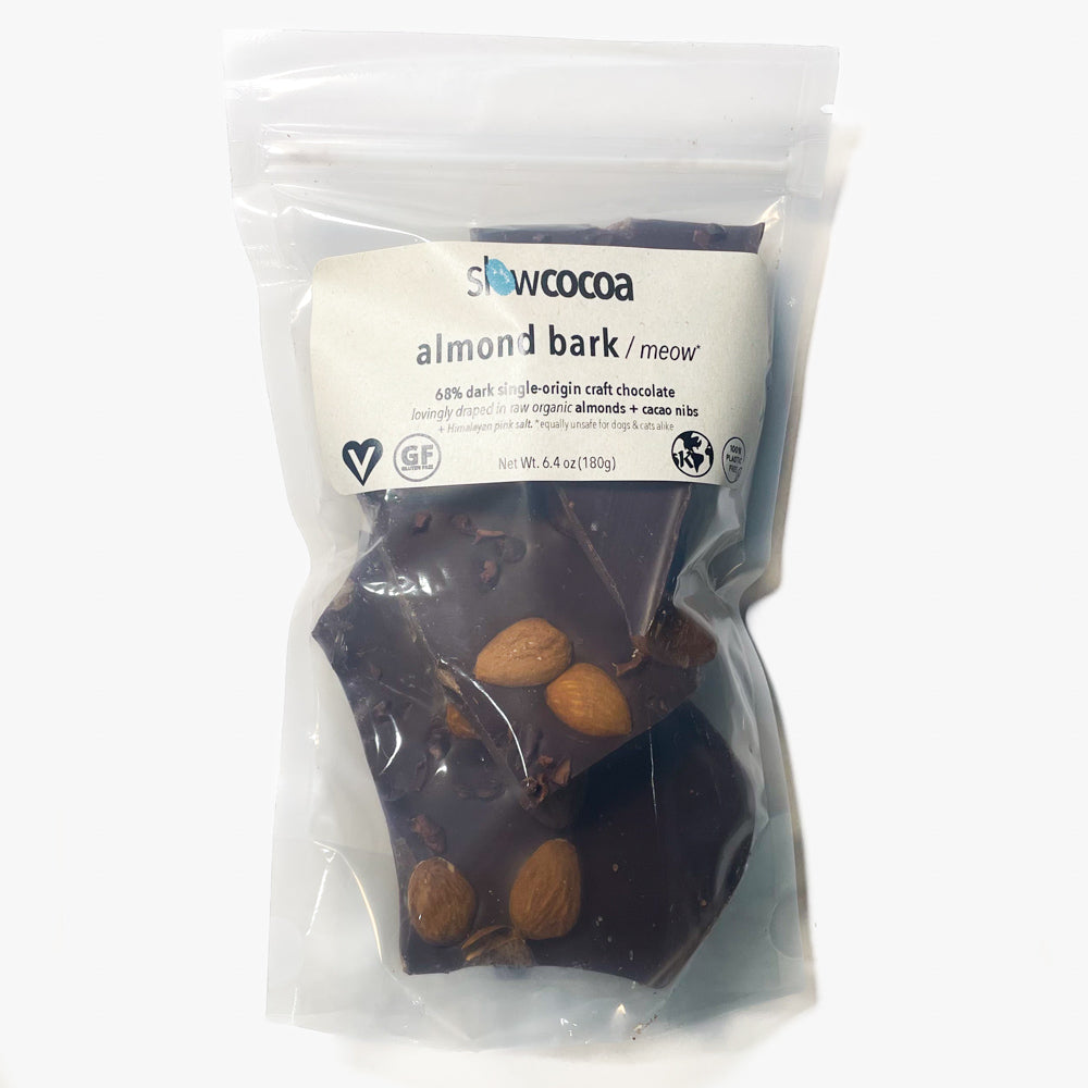 Packaged almond bark with almonds visible, branded 'slowcocoa'.