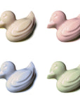 slowcocoa craft chocolate Easter ducks in white, pink, purple and green, in a grid along white background